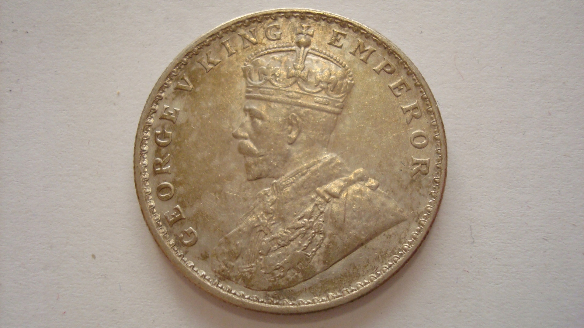 Moneta1rupiaIndie1919stan2 belsilt Indijos 1 rupijos sidabrinė moneta 1919 m būklė 2