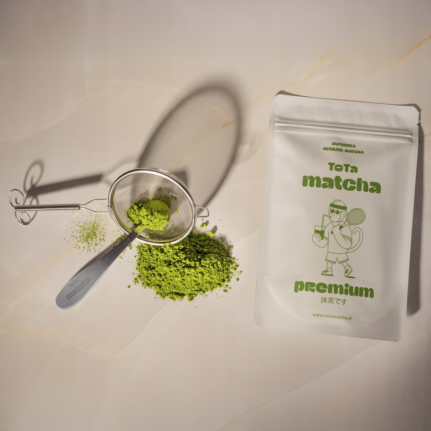 MatchaPremium100gJaponskamatchazpierwszegozbioruAichiToTaMarkaToTaMatcha belsilt Japoniška matcha arbata premium bio pirmojo derliaus ir Aichi ToTa 100 g